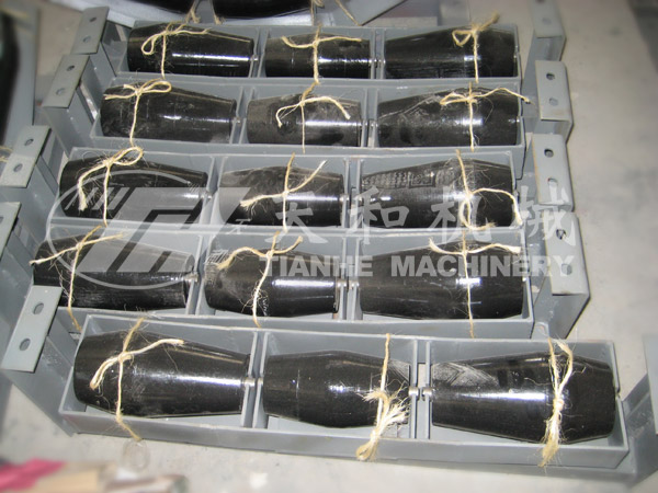 Barrel-type return self-aligning idler