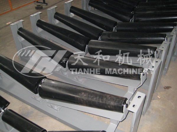 Carrier taper self-aligning idler